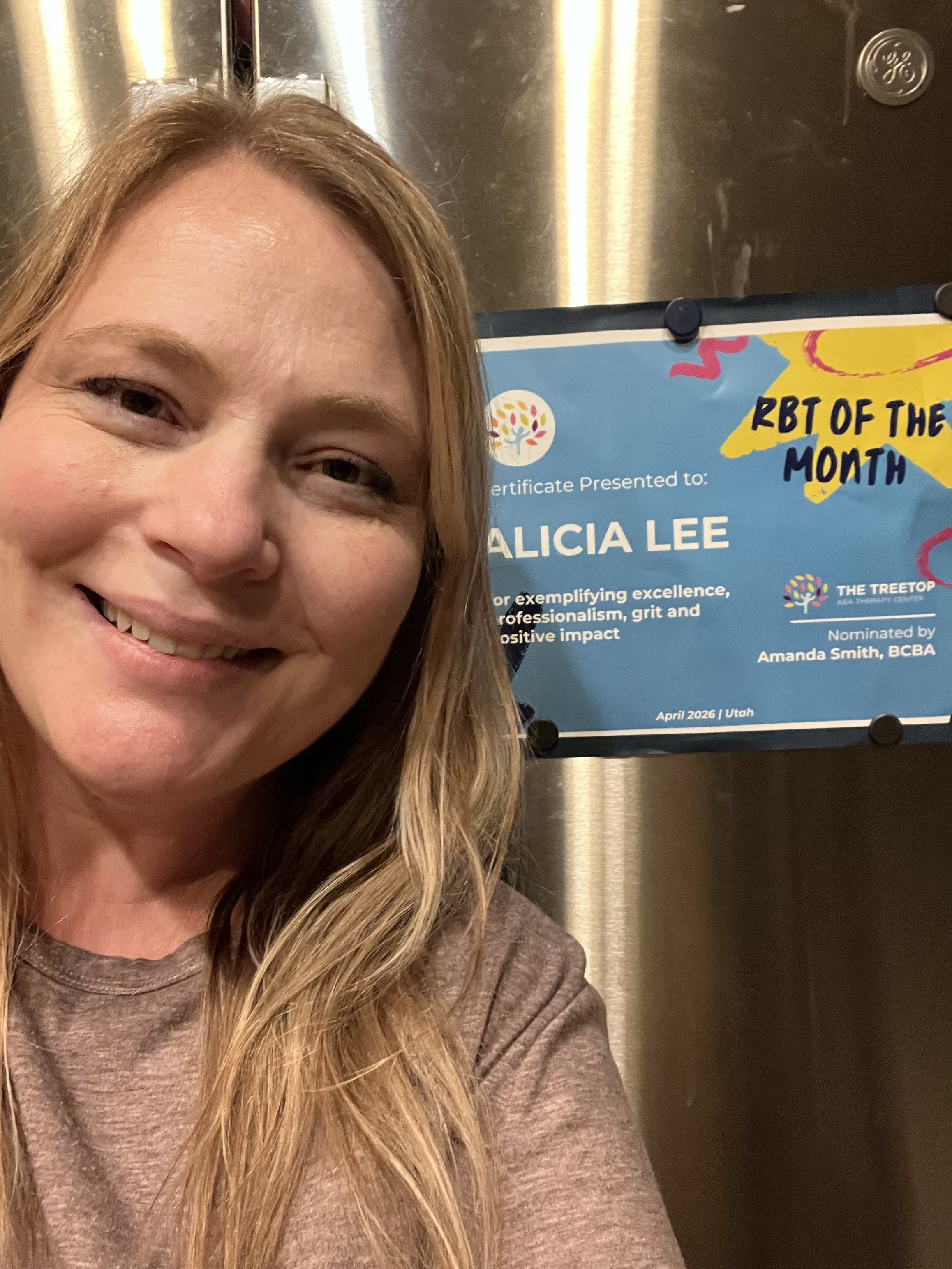 Alicia Lee with her BT of the Month certificate