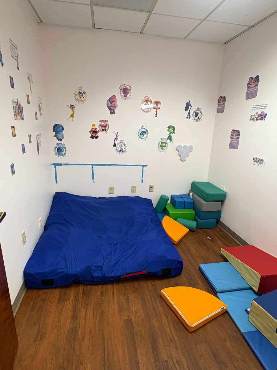 Inside Out themed sensory room with crash mat