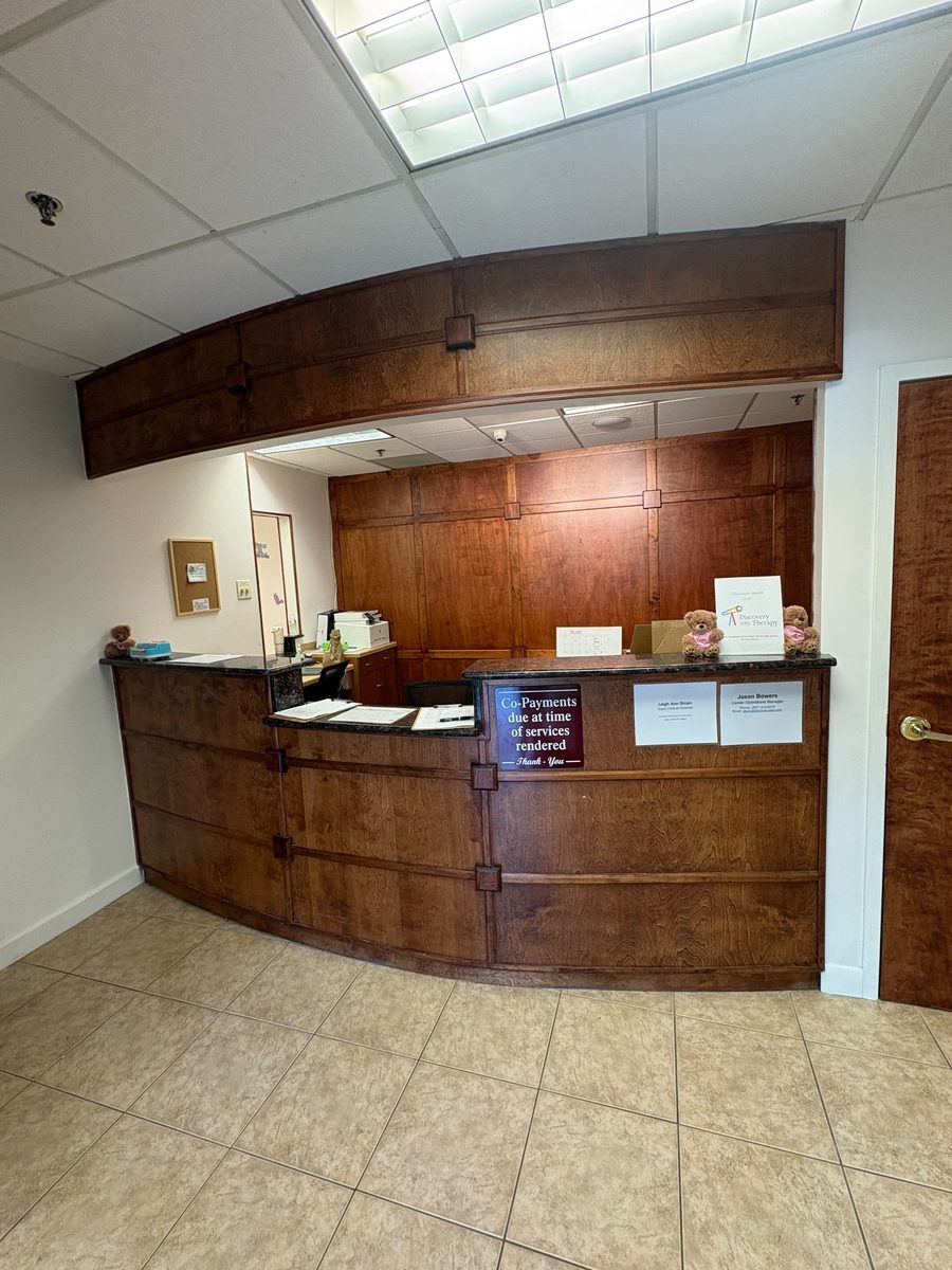 Discovery Therapy wooden front desk