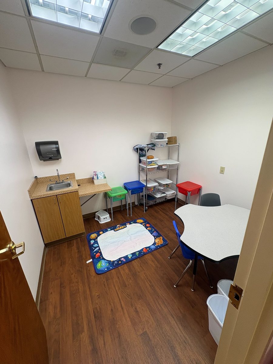 Quiet session room with sensory mat and table